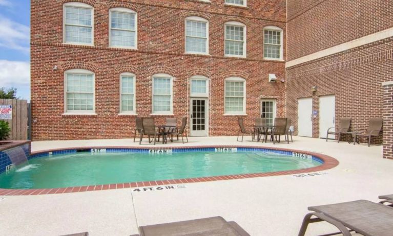 Refreshing outdoor pool at Liberty Hotel Cleburne, An Ascend Hotel Collection Member.