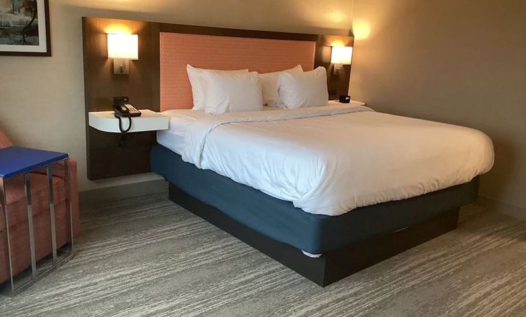 Comfortable delux king room with natural light at Hampton Inn By Hilton Port Hope.