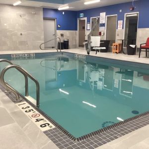 Relaxing indoor pool with seating area at Hampton Inn By Hilton Port Hope.