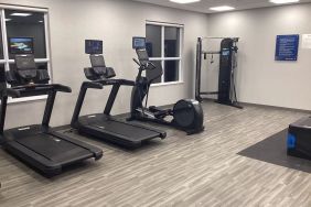 Equipped fitness center with treadmills at Hampton Inn By Hilton Port Hope.