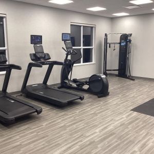 Equipped fitness center with treadmills at Hampton Inn By Hilton Port Hope.