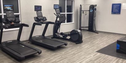 Equipped fitness center with treadmills at Hampton Inn By Hilton Port Hope.