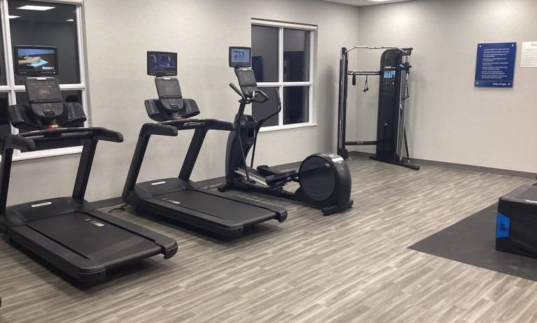 Equipped fitness center with treadmills at Hampton Inn By Hilton Port Hope.