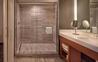 Private guest bathroom with shower at Courtyard Philadelphia City Avenue.