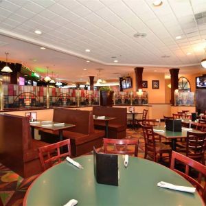 Dining area perfect for coworking at Best Western Plus BWI Airport Arundel Mills.
