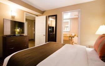 Delux king bed with TV at Best Western Plus Ottawa/Kanata Hotel & Conf.