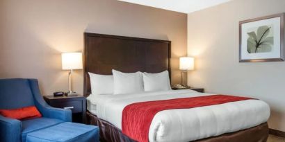 Cozy king bedroom with private bathroom at Best Western San Diego Zoo/SeaWorld Inn & Suites.