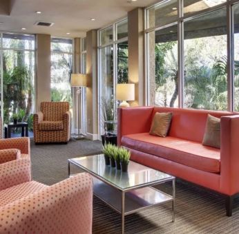 Lobby and coworking space at Best Western San Diego Zoo/SeaWorld Inn & Suites.