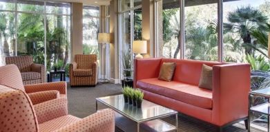 Lobby and coworking space at Best Western San Diego Zoo/SeaWorld Inn & Suites.