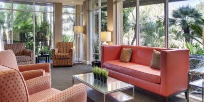 Lobby and coworking space at Best Western San Diego Zoo/SeaWorld Inn & Suites.