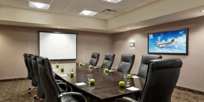 Professional meeting room at Acclaim Hotel Calgary Airport.