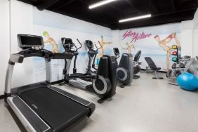 Well equipped fitness center at Hotel Studio Allston.