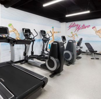 Well equipped fitness center at Hotel Studio Allston.