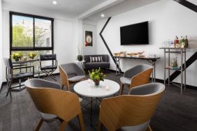 Comfortable lobby and coworking space at Hotel Studio Allston.