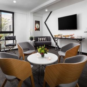 Comfortable lobby and coworking space at Hotel Studio Allston.