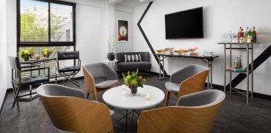 Comfortable lobby and coworking space at Hotel Studio Allston.