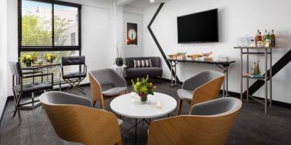 Comfortable lobby and coworking space at Hotel Studio Allston.