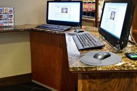 Dedicated business center with PC, internet, and printer at Hampton Inn Manhattan Chelsea.