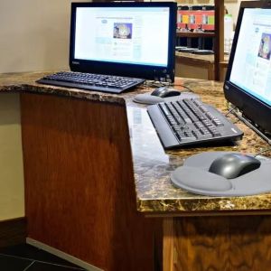 Dedicated business center with PC, internet, and printer at Hampton Inn Manhattan Chelsea.