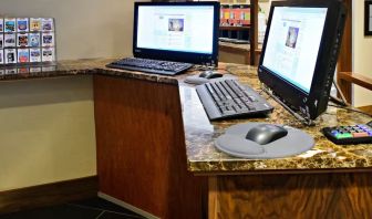 Dedicated business center with PC, internet, and printer at Hampton Inn Manhattan Chelsea.