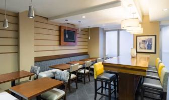 Dining and coworking space at Hampton Inn Manhattan Chelsea.