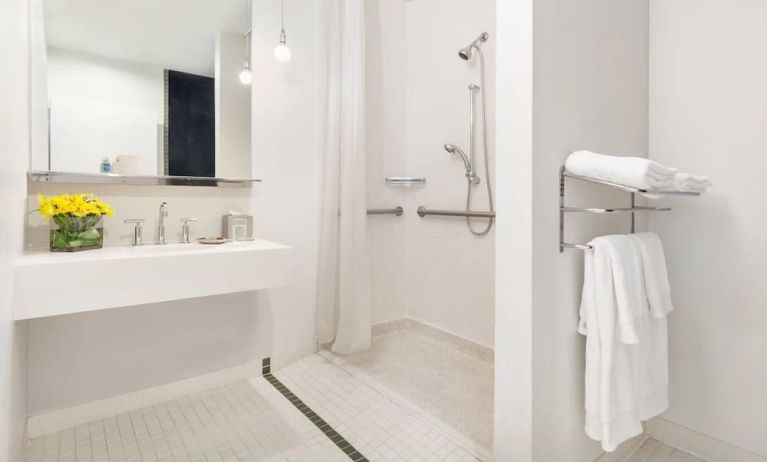 Guest bathroom with shower at Nu Hotel - Brooklyn.