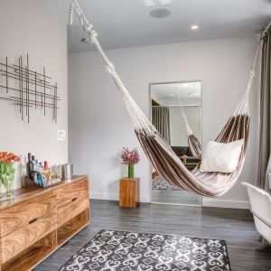 Relaxing day room with hammock and chilled-out workspace at Nu Hotel - Brooklyn.