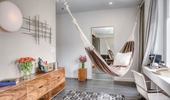 Relaxing day room with hammock and chilled-out workspace at Nu Hotel - Brooklyn.