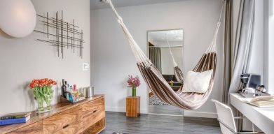 Relaxing day room with hammock and chilled-out workspace at Nu Hotel - Brooklyn.