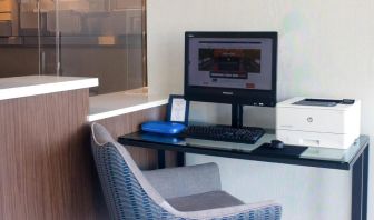 Dedicated business center with PC, internet, and printer at Holiday Inn Express & Suites Boston-Cambridge.