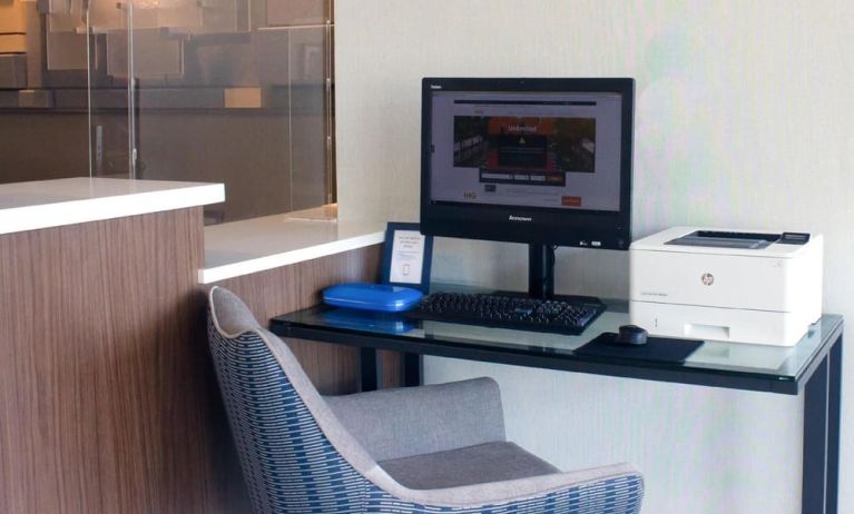 Dedicated business center with PC, internet, and printer at Holiday Inn Express & Suites Boston-Cambridge.