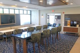 Dining and coworking space at Holiday Inn Express & Suites Boston-Cambridge.