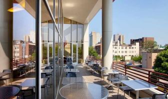 pretty outdoor terrace ideal as a coworking space at Homewood Suites by Hilton University City.