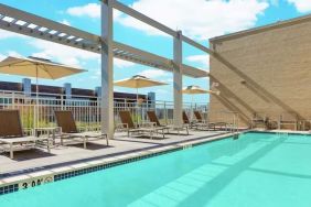 Lovely outdoor pool with pool chairs at Hilton Garden Inn Washington DC / Georgetown Area.