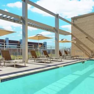 Lovely outdoor pool with pool chairs at Hilton Garden Inn Washington DC / Georgetown Area.