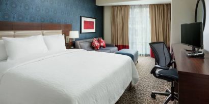 Delux king room with TV and work space at Hilton Garden Inn Washington DC / Georgetown Area.