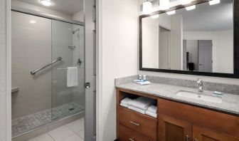 Private guest bathroom with shower at Hyatt House Scottsdale.