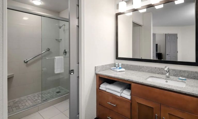 Private guest bathroom with shower at Hyatt House Scottsdale.