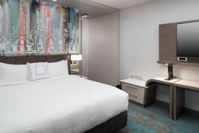 King bedroom with TV at Courtyard By Marriott Houston Heights/I-10.