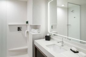 Private guest bathroom with shower at Courtyard By Marriott Houston Heights/I-10.