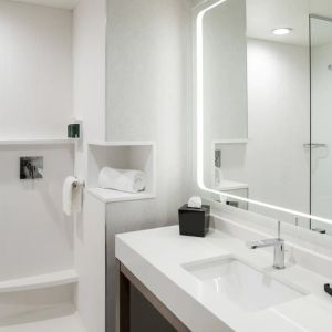 Private guest bathroom with shower at Courtyard By Marriott Houston Heights/I-10.