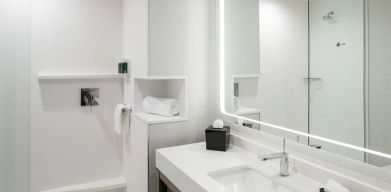 Private guest bathroom with shower at Courtyard By Marriott Houston Heights/I-10.