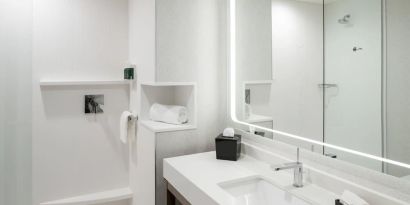 Private guest bathroom with shower at Courtyard By Marriott Houston Heights/I-10.