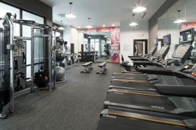 Well equipped fitness center at Courtyard By Marriott Houston Heights/I-10.