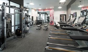 Well equipped fitness center at Courtyard By Marriott Houston Heights/I-10.