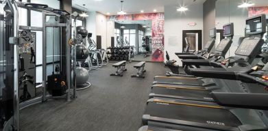 Well equipped fitness center at Courtyard By Marriott Houston Heights/I-10.