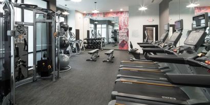 Well equipped fitness center at Courtyard By Marriott Houston Heights/I-10.