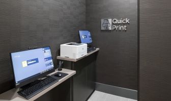 Dedicated business center with PC, printer, and internet at Courtyard By Marriott Houston Heights/I-10.