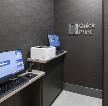 Dedicated business center with PC, printer, and internet at Courtyard By Marriott Houston Heights/I-10.