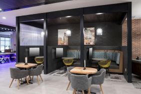 Lounge and coworking space with work pods at Courtyard By Marriott Houston Heights/I-10.